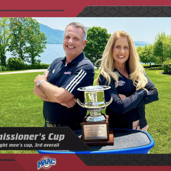 Athletics Team posing with Commissioners Cup