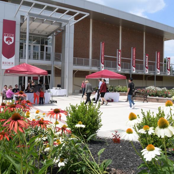 Students gather in front of the BLC 