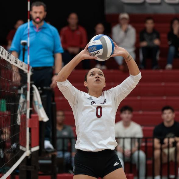 WVB player sets the ball