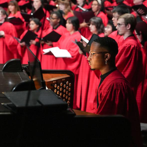 Chapel Choir performs in red robes