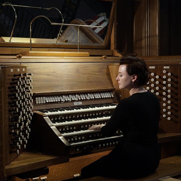 Damin Spritzer photographed playing the organ.