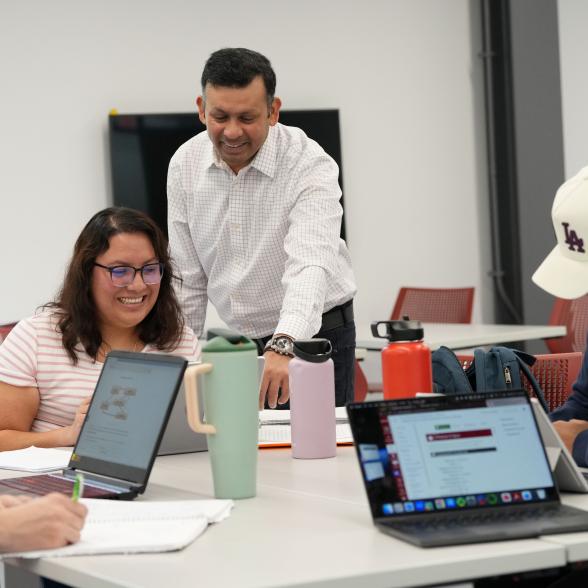 Professor interacts with students in class