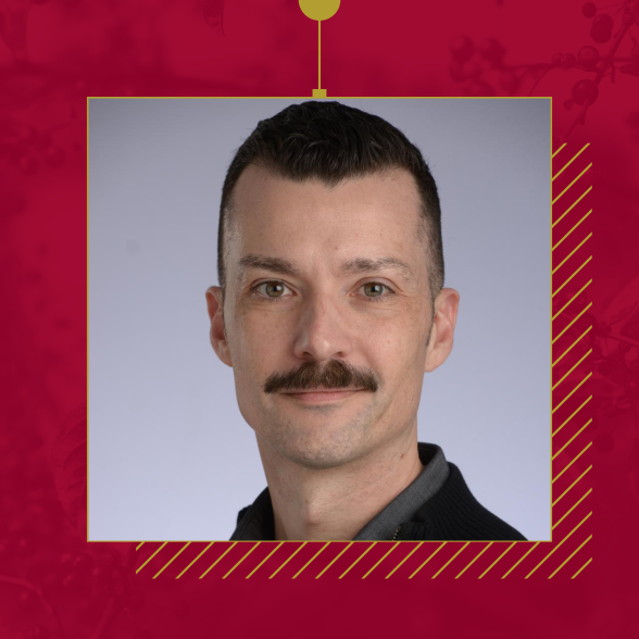 Headshot of Jason Vodicka on a red background