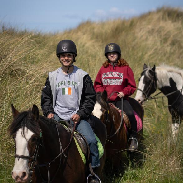 Study abroad students in Ireland riding horses
