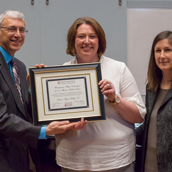 Susan Myers Riley '03 with Dean Marshall Onofrio and Profess