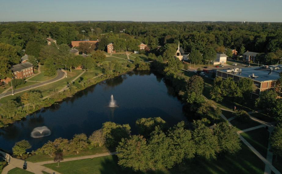 Aerial view of campus with lake