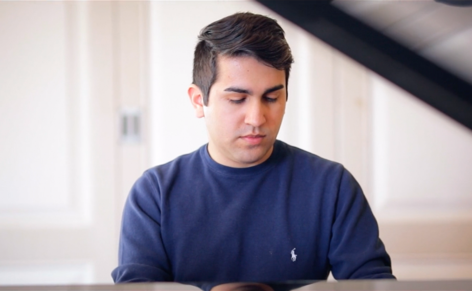 Student playing piano.