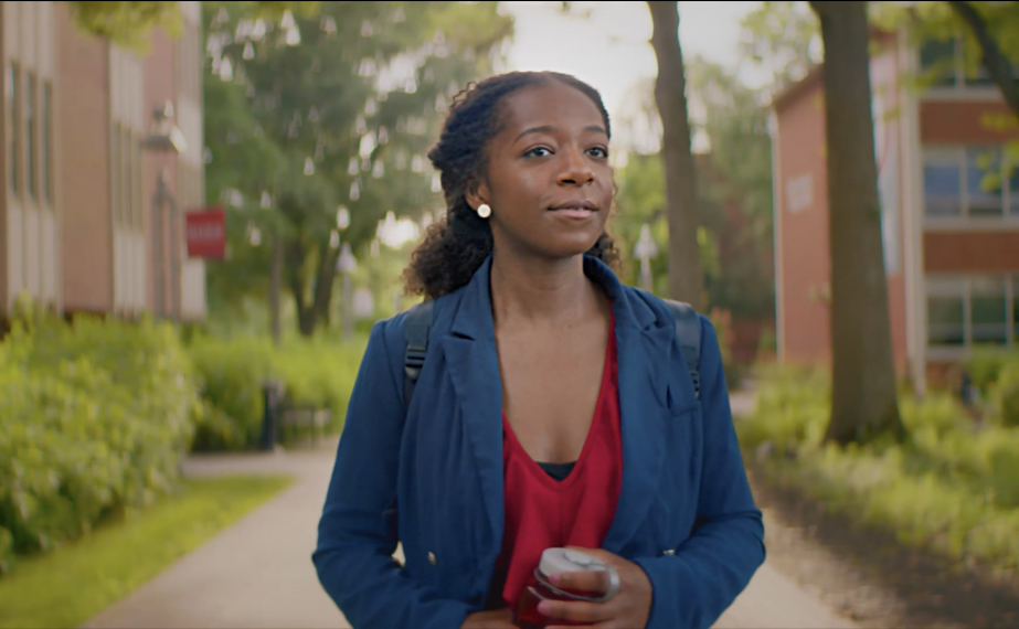 Woman walks on Rider campus