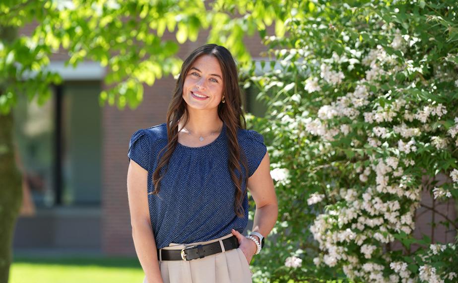 Allison Stewart poses for picture on campus