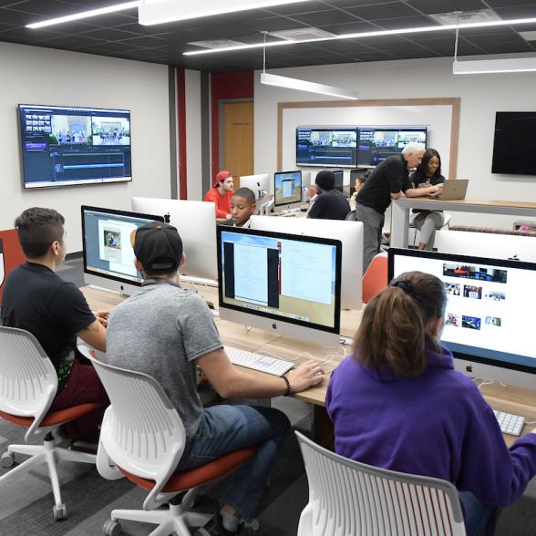 Media lab filled with students at computers