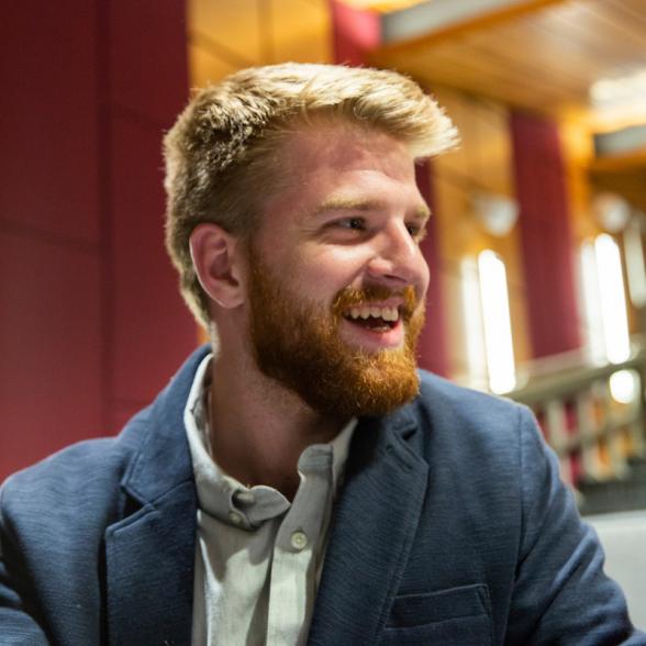 Happy student at a presentation.