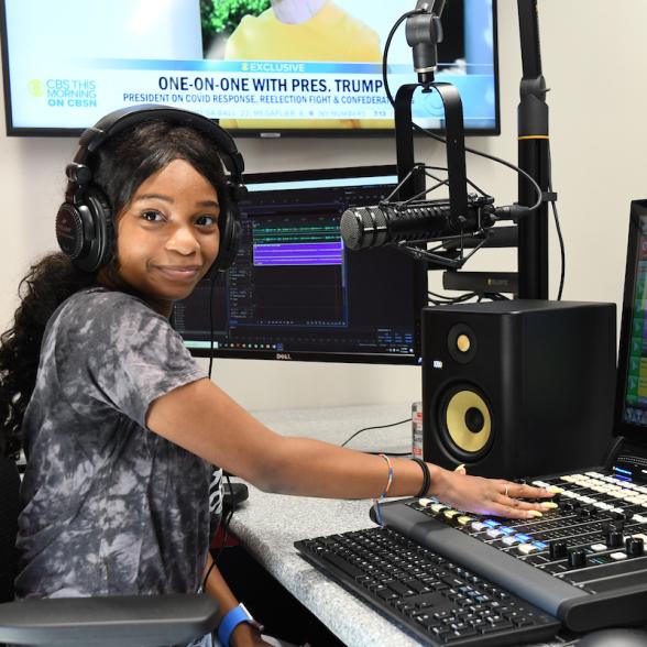 Female student in the radio lab