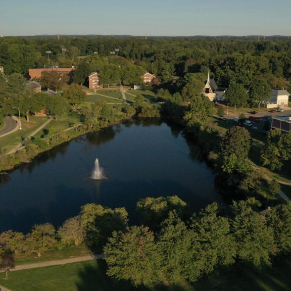 Aerial view of campus with lake