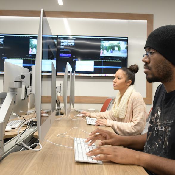 Two students in the computer lab