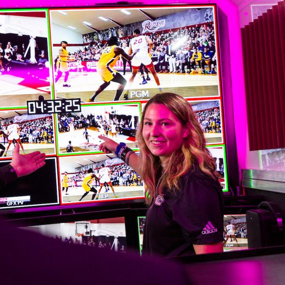 Female student in sports media lab