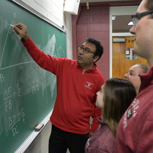 Rider students with math professor