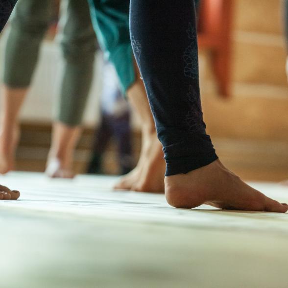 Feet in a dance studio.