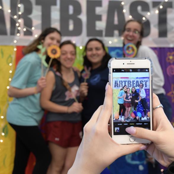 Group of female students posing at Art Beast event