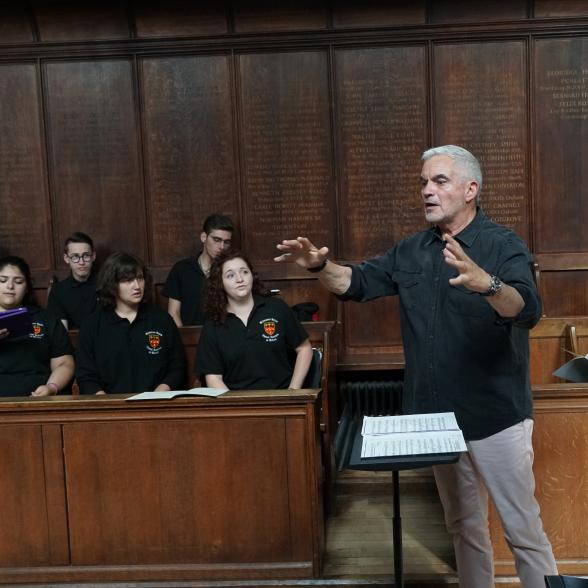 James Joyce, faculty, leads a choral conducting classroom
