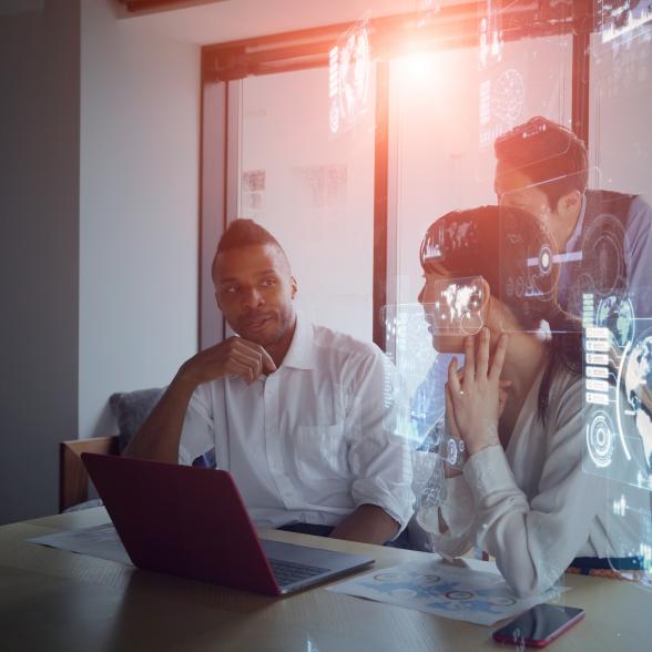 Cybersecurity professionals discuss a project