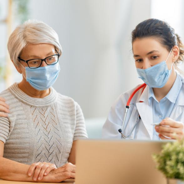 A nurse with an old couple.