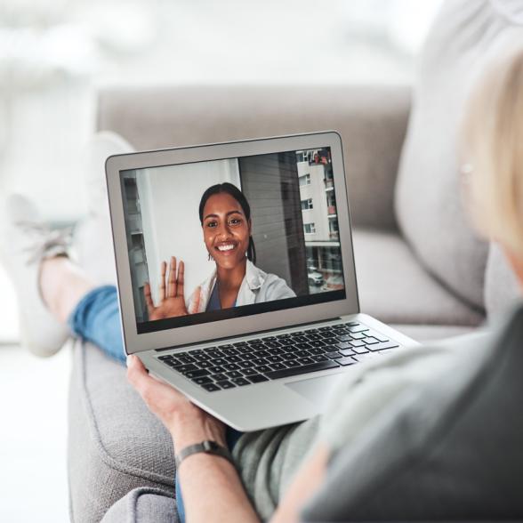 Healthcare provider speaks with woman over video call