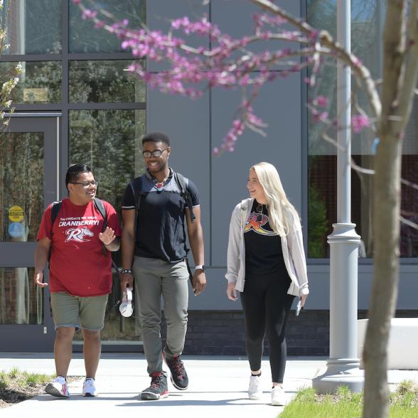 Students walk across campus