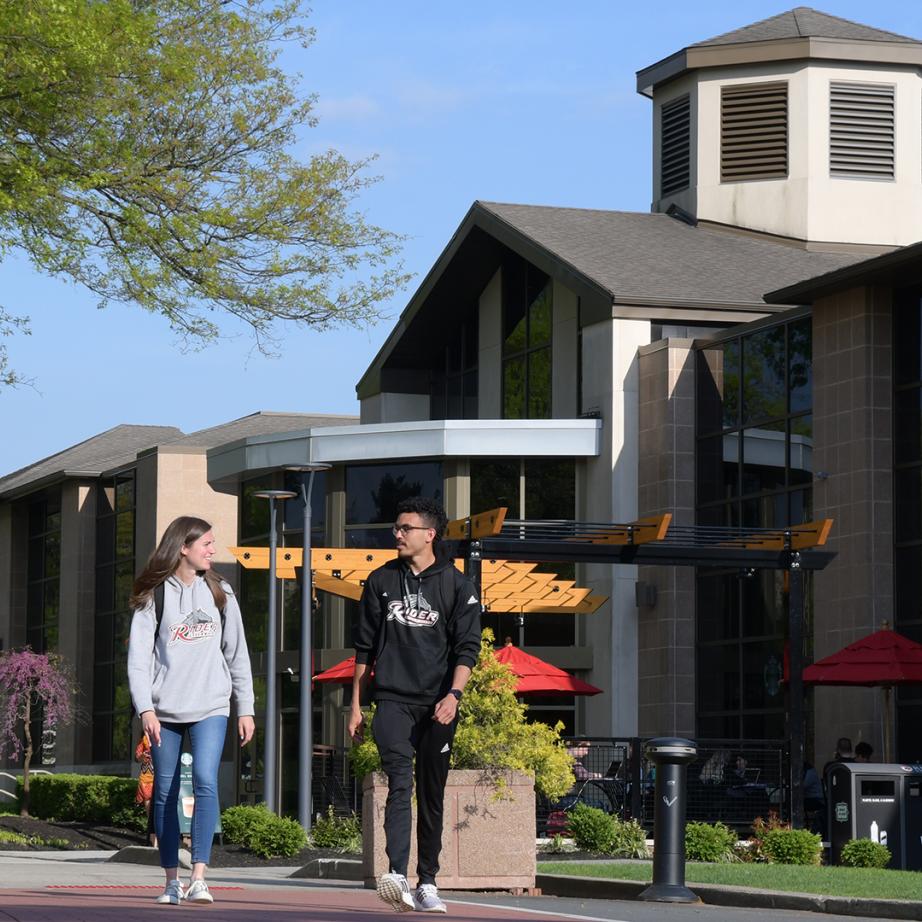 Two students walk near Student Recreation Center