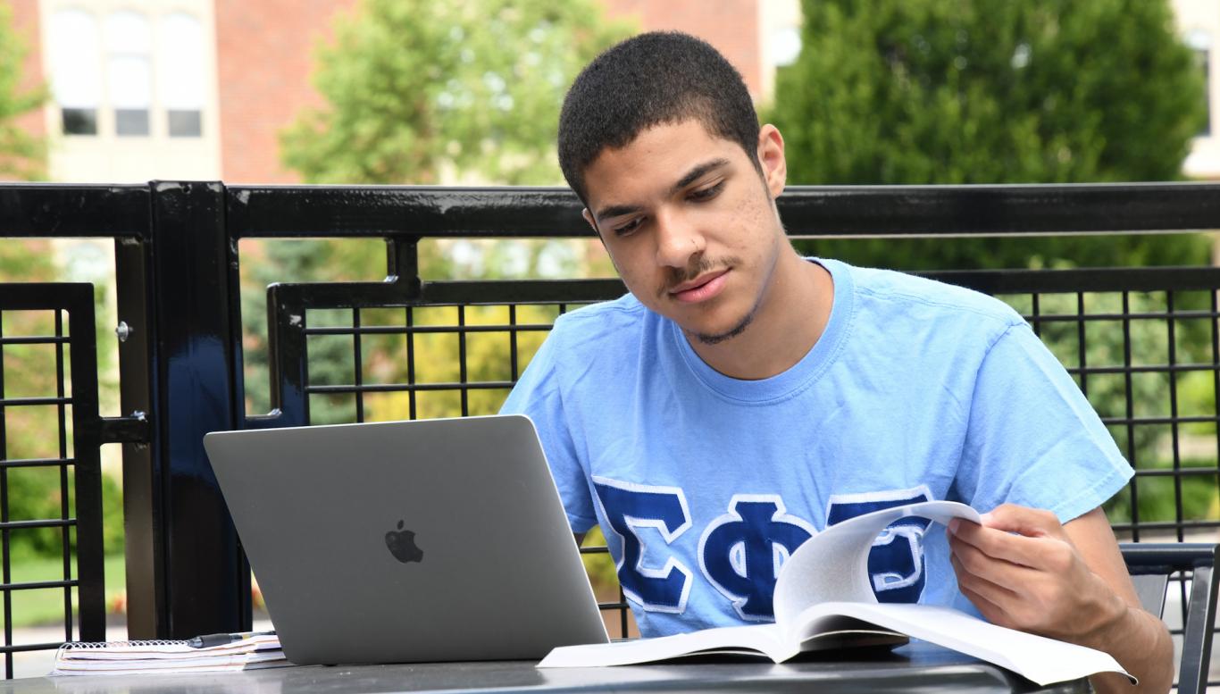 Student studying outside