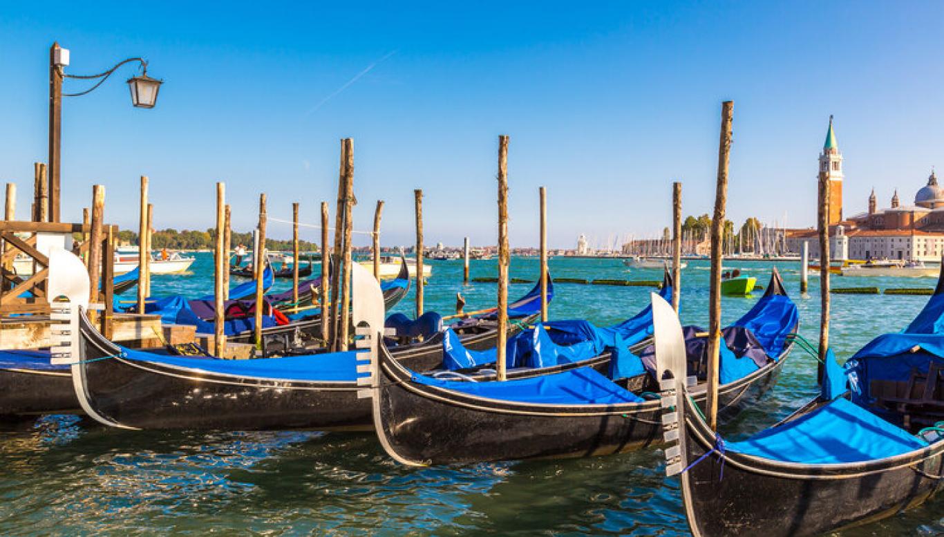 Photo of boats on water in Venice