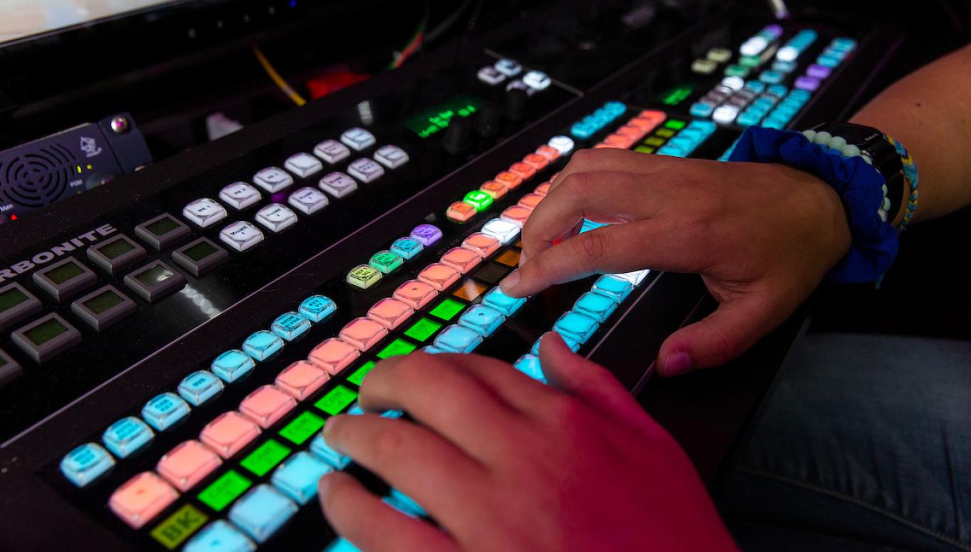 Person typing on a keyboard