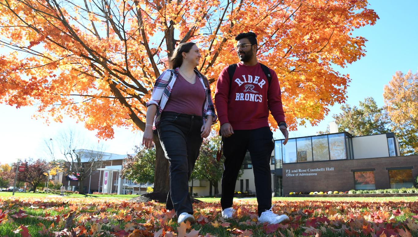 Students walking by Admissions
