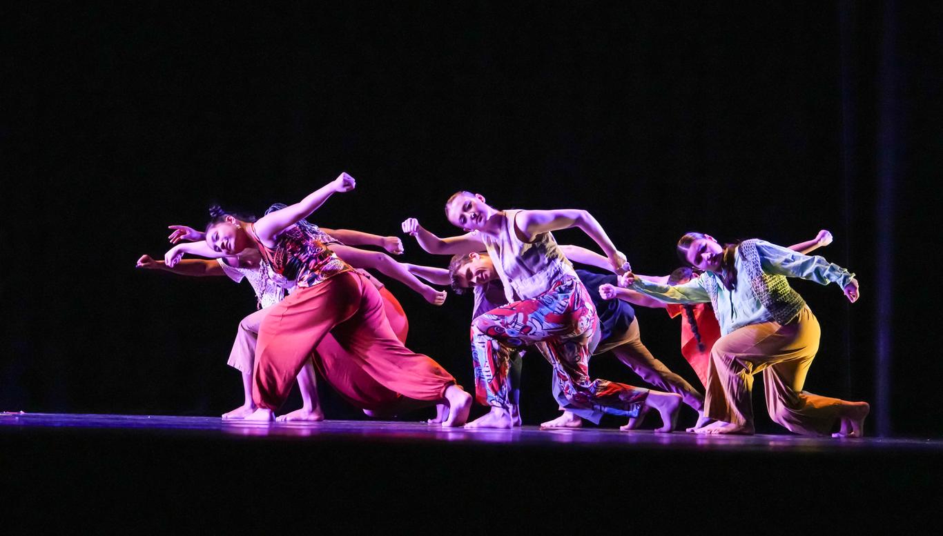 Rider student dancers on stage performing