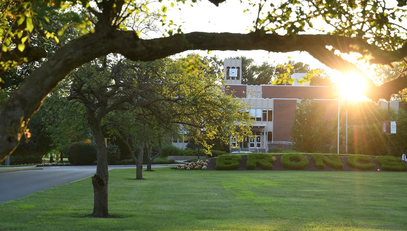 Sun sets over Moore Library