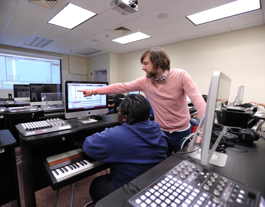 Professor points to computer of student