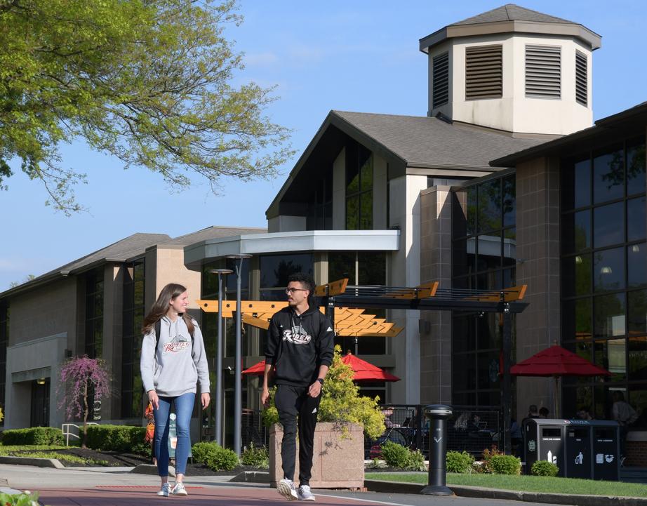 Two students walk near Student Recreation Center
