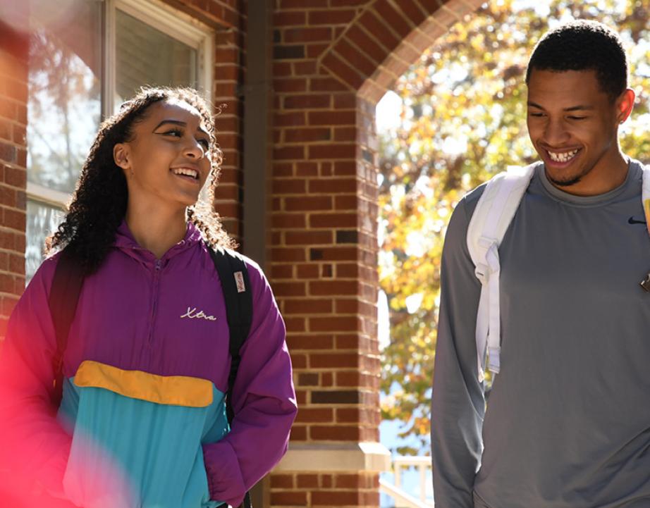 Two students walk to class
