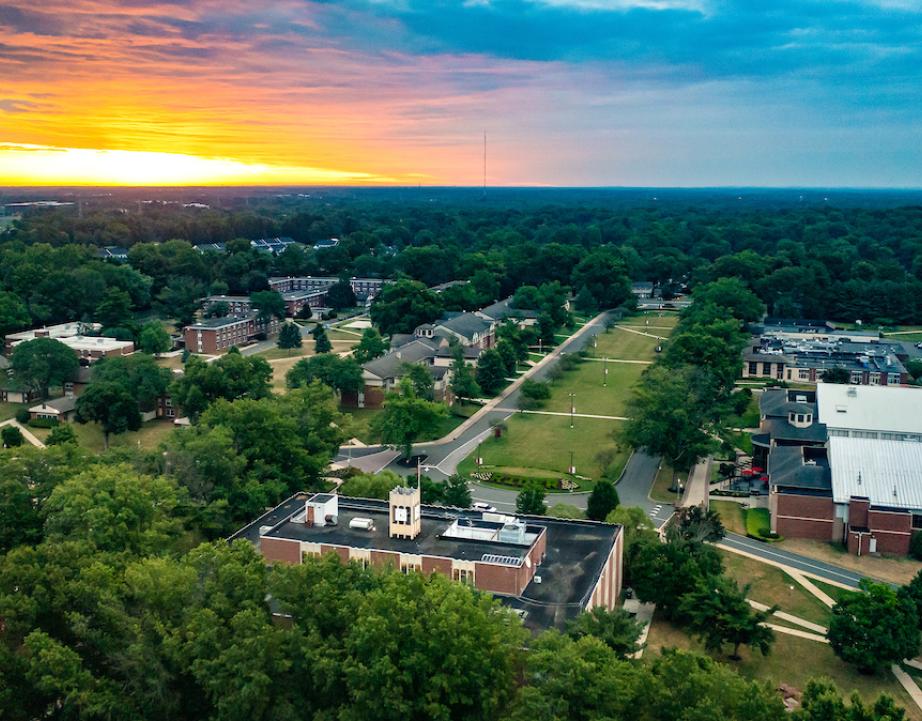 Bird's eye view of sunrise over campus