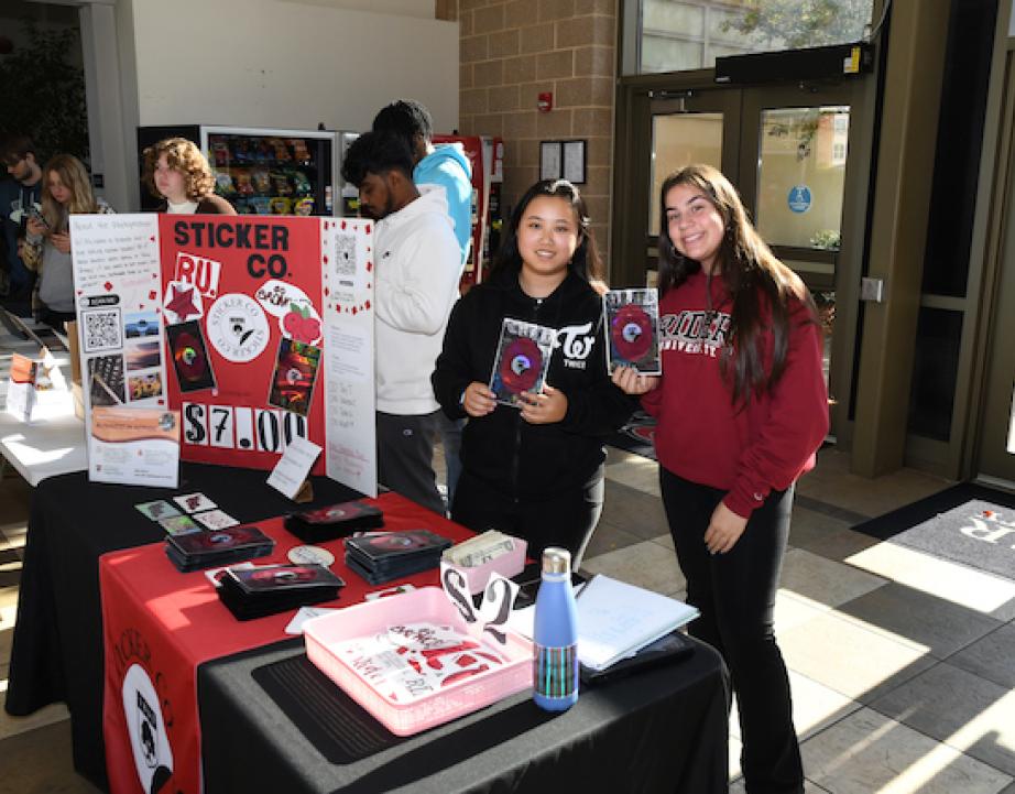 Students pose at the Market Fair.