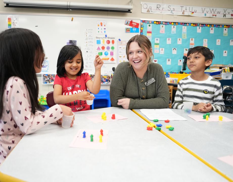 a student teacher in a classroom of young students