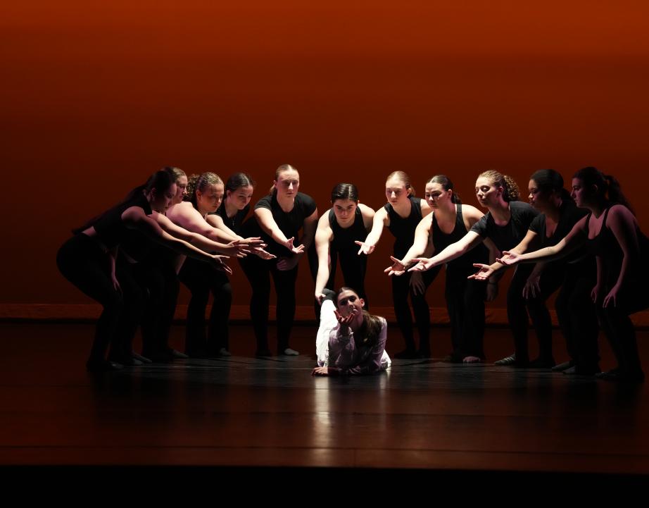 dancers with dramatic lighting