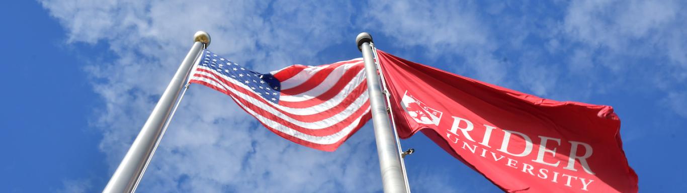 American flag and Rider flag on campus