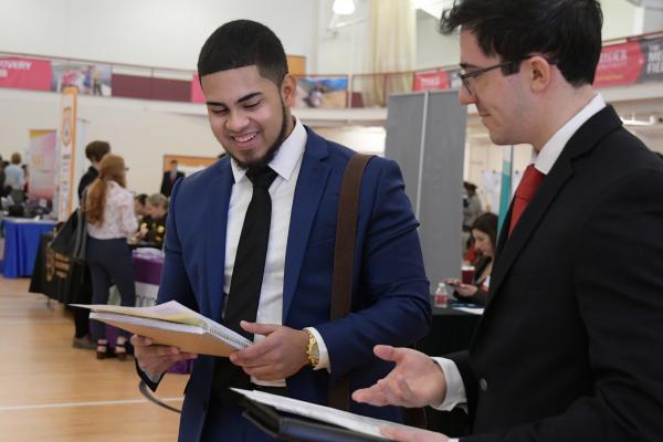 Students meet with employers at career fair