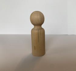 Wooden block shaped like a person