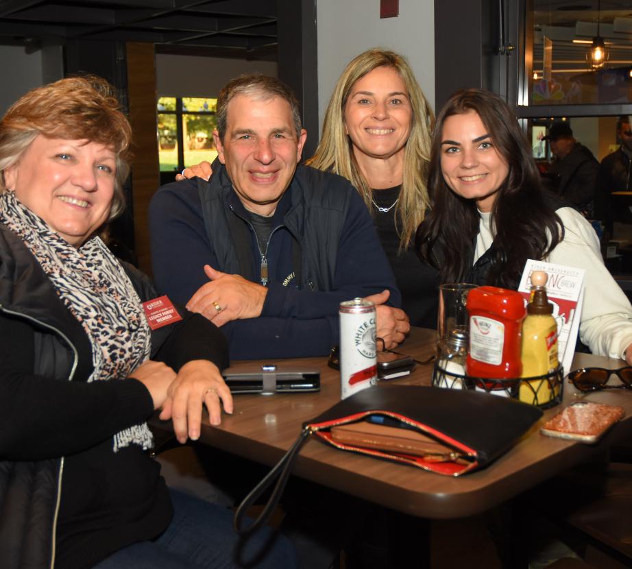 Family in the pub during Homecoming