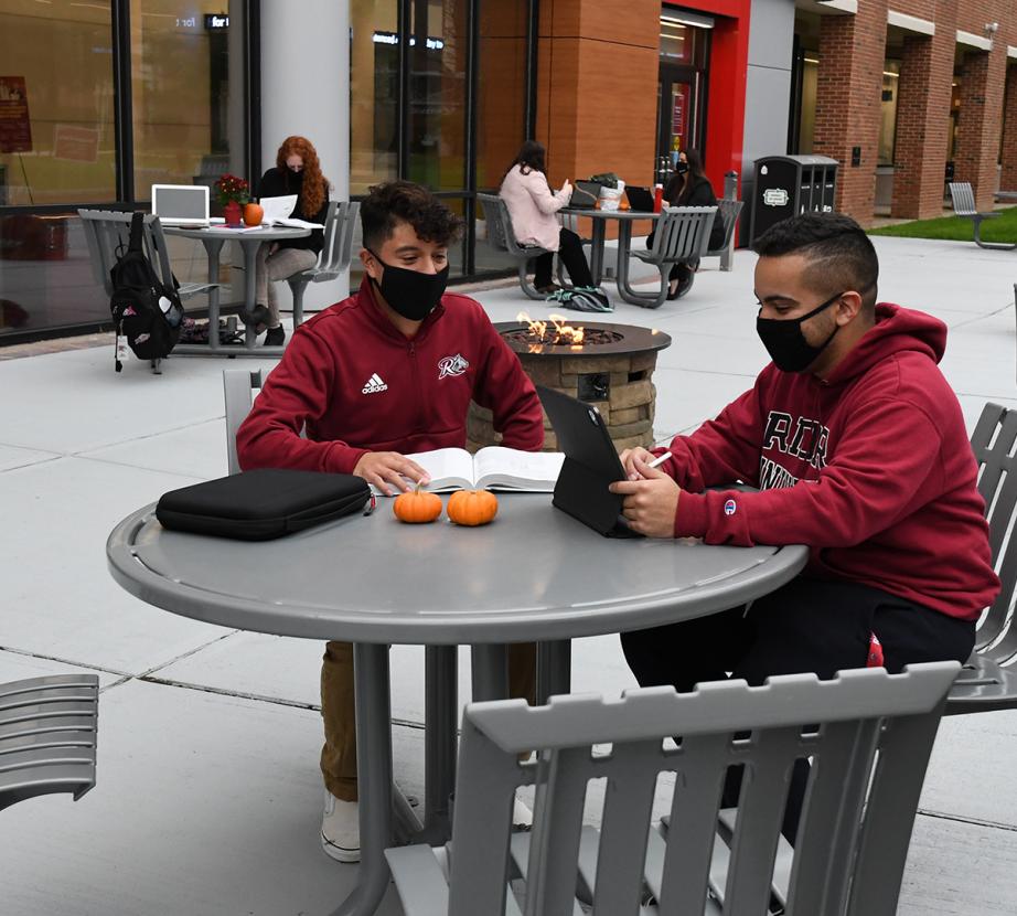 Masked students on Rider's campus