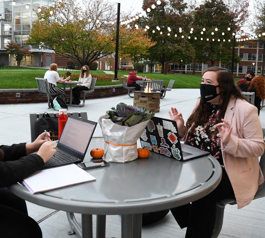 Masked students on Rider's campus