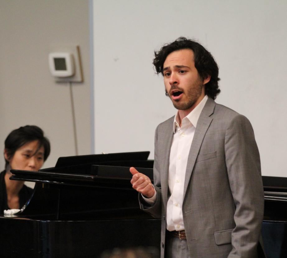 Male student sings with piano