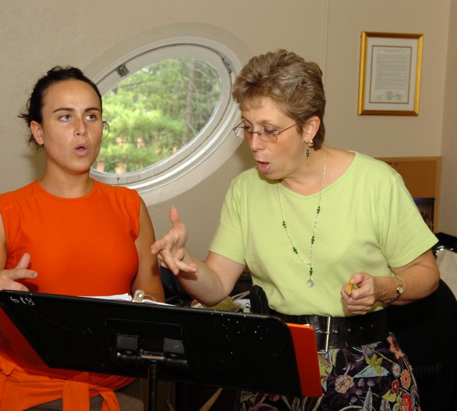 Faculty working with female voice student