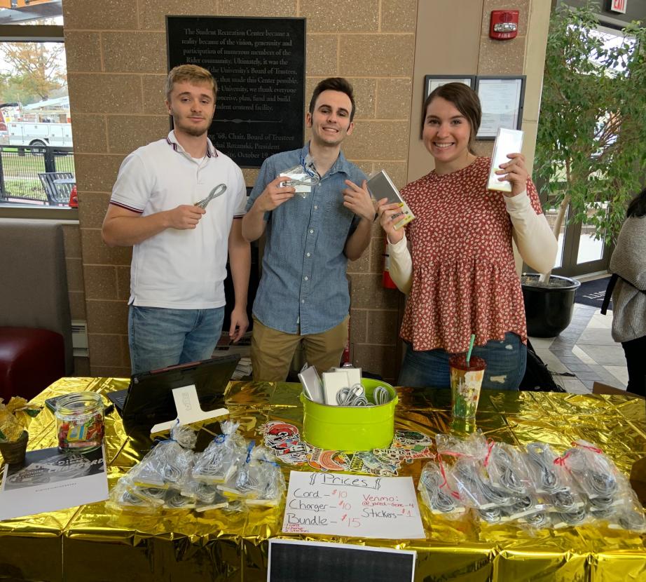 Students pose for photo at Business in Action event